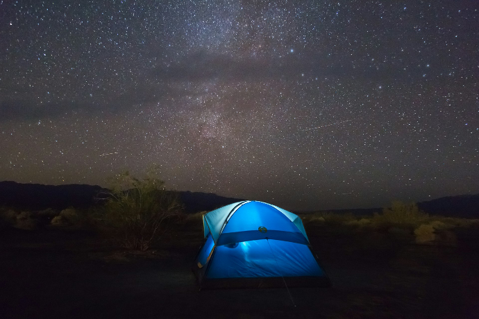 blue tent under starry sky