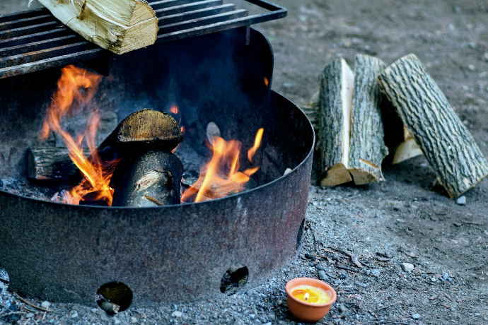 burning firewoods on grille